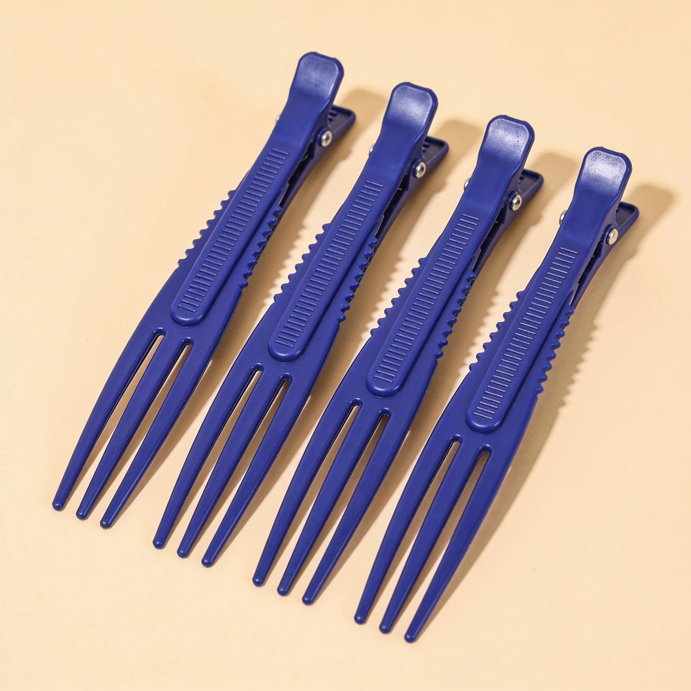 Alligator Section Clips — four matte cobalt nylon clips; serrated jaws and steel pivot springs