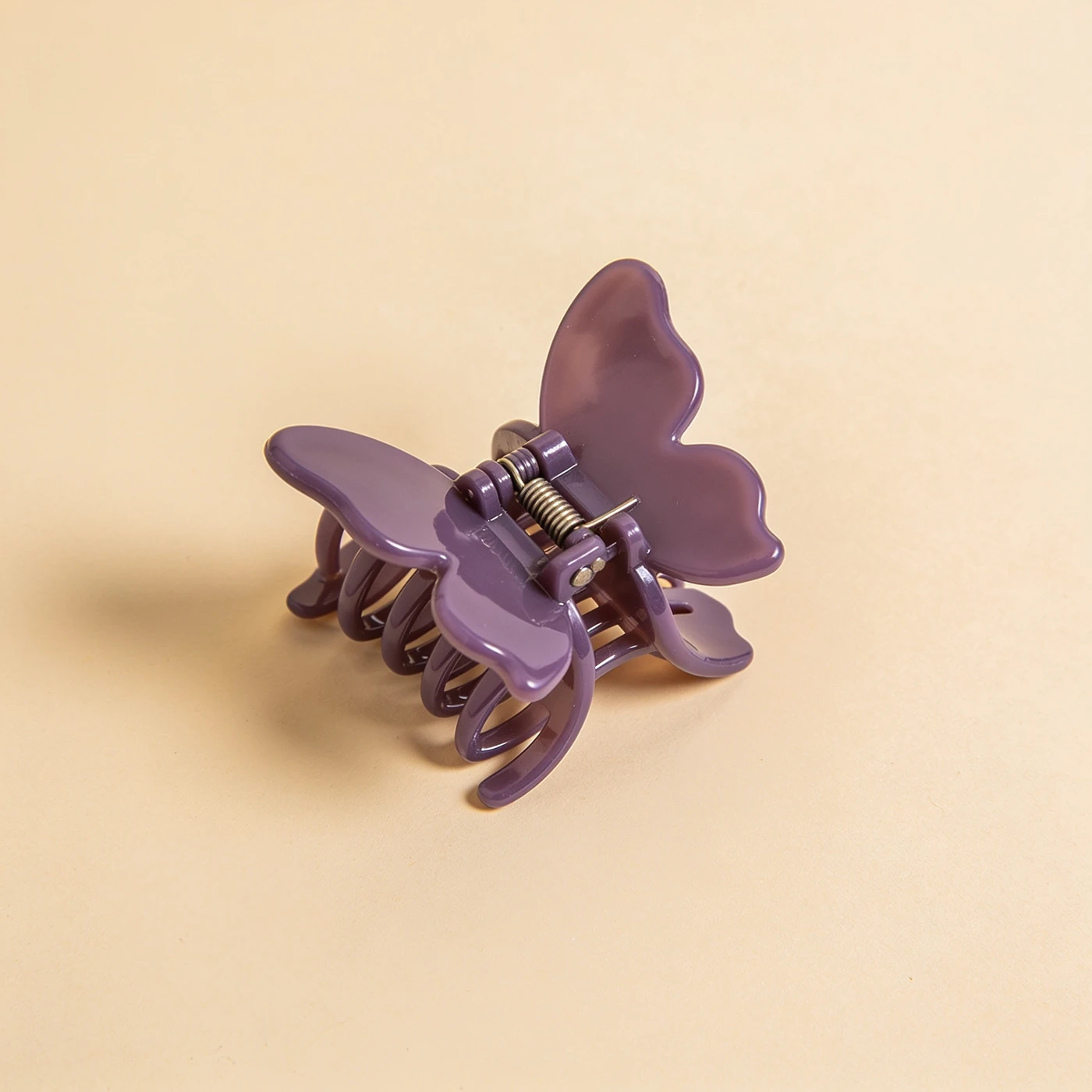 Butterfly Claw Clip — one opaque violet cellulose acetate butterfly claw with interlocking curved teeth and steel spring